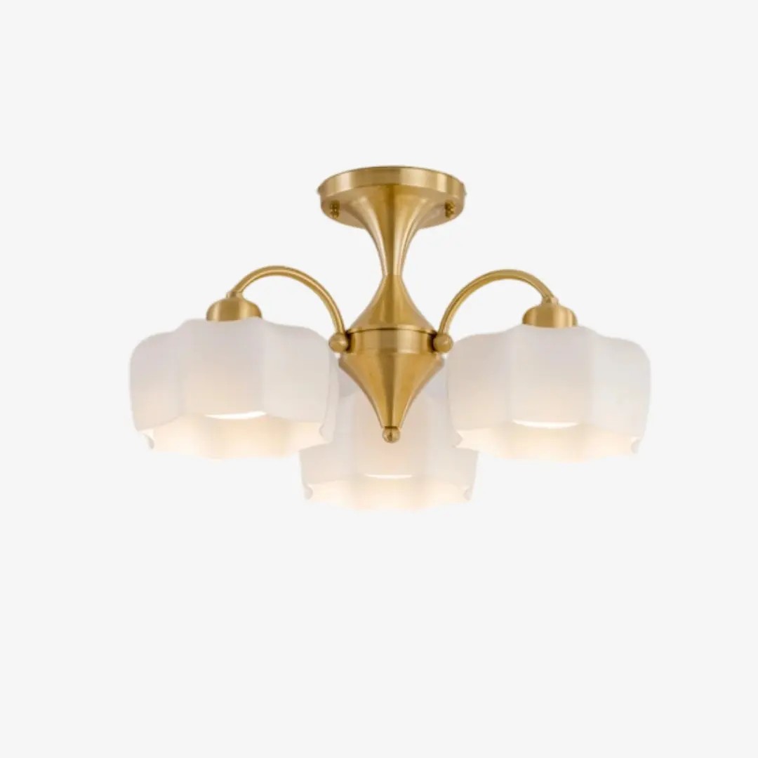 Three-light white glass flush mount with brushed gold frame