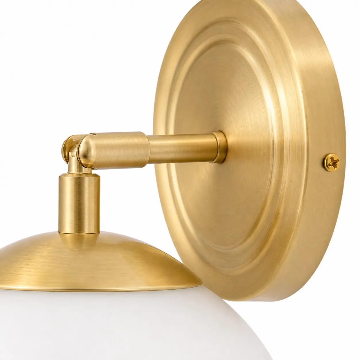Placa de pared de oro cepillado y detalle del brazo de la lámpara articulado