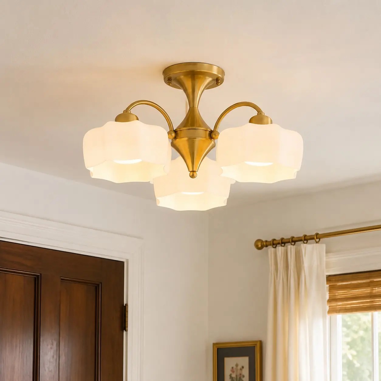 Brushed gold and white glass ceiling light in a warm entryway