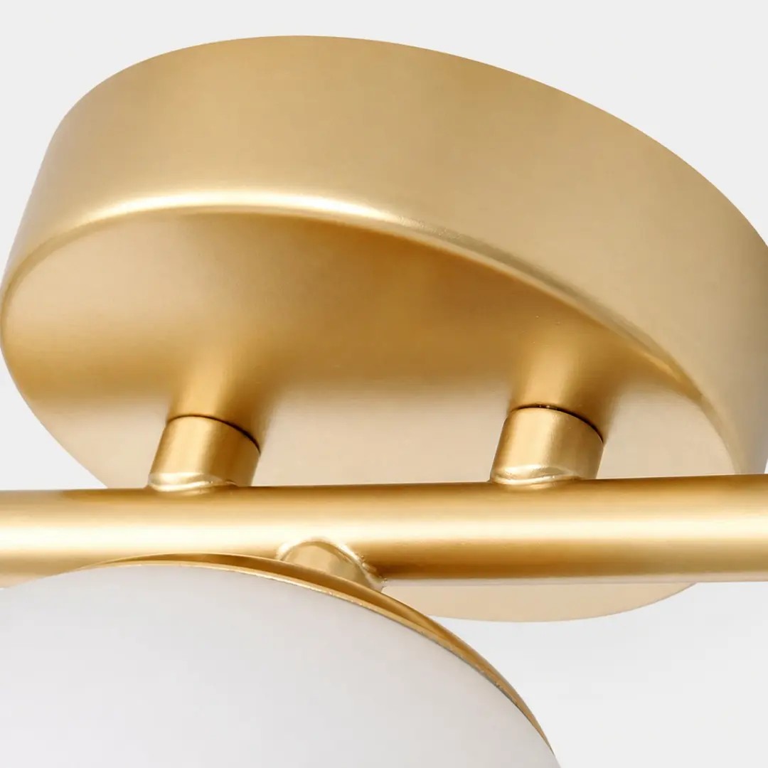 Close-up of the gold arm and mounting joints